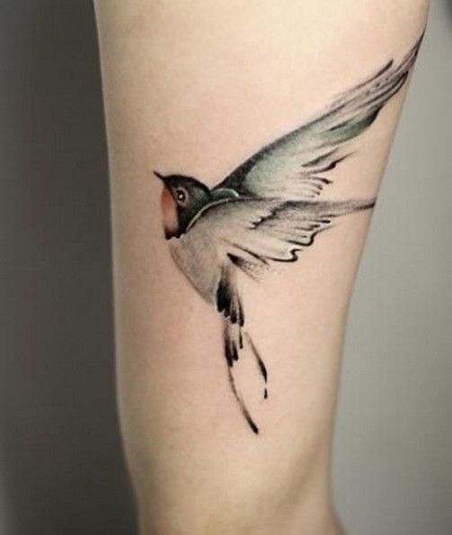 Calf tattoo with bird