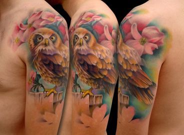 Arm tattoo with owl