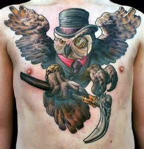 Awesome owl tattoo on chest