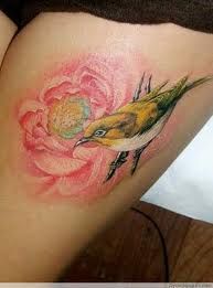 Bird and flower tattoo