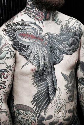 Bird and spider tattoo