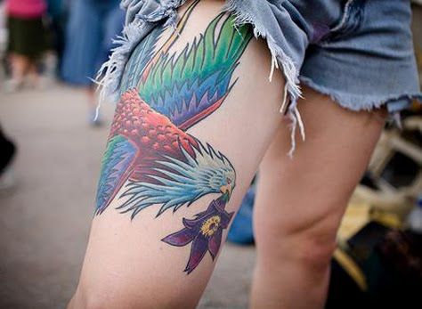 Bird with flower tattoo