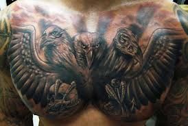 Bird with three heads tattoo