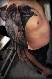 Black magpie as arm tattoo