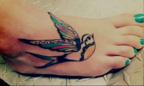 Decorative swallow tattoo