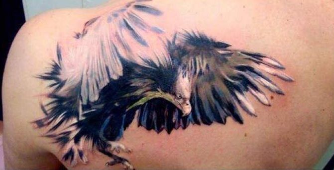 Eagle wings tattoo