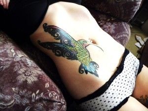 Green hummingbird tattoo