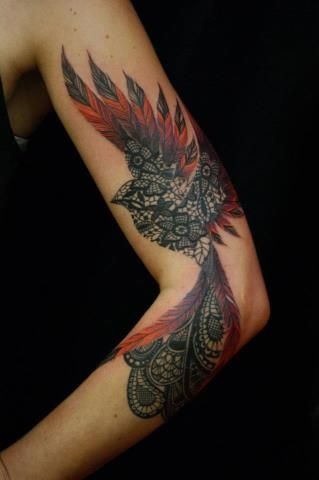 Hand tattoo with bird