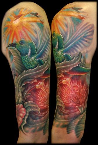 The hummingbird among the flowers