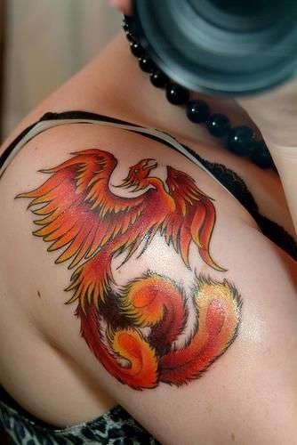 Orange phoenix tattoo