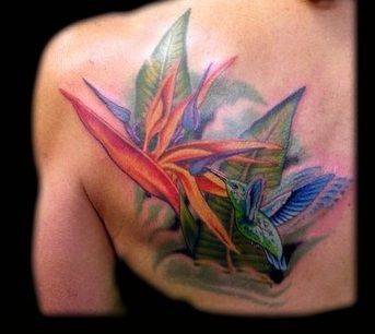 Paradise flower with bird tattoo