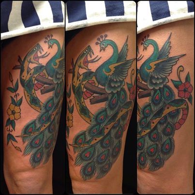 Peacock and snake tattoo