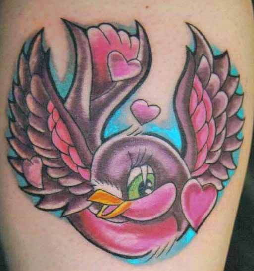 Pink bird with hearts tattoo