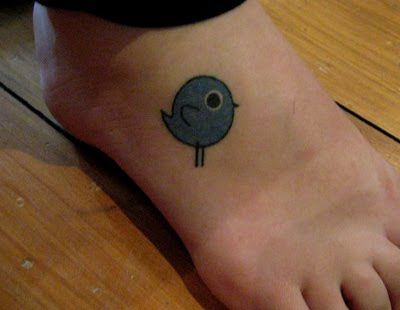 Small blue bird tattoo