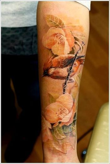 Sparrow among flowers tattoo