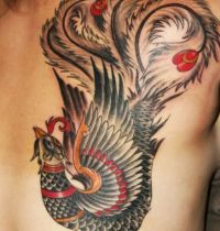 Awesome bird as back tattoo