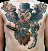 Awesome owl tattoo on chest