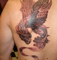 Back tattoo with bird