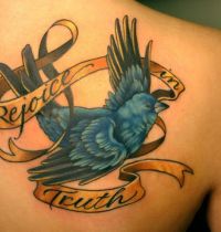Bird and ribbons tattoo