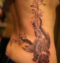 Bird and rose tattoo back