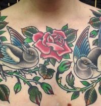 Birds among roses tattoo