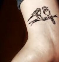 Birds couple tattoo on wrist