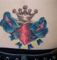 Tattoo of blue birds with heart