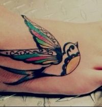 Decorative swallow tattoo