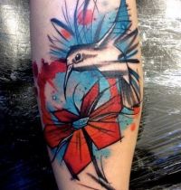 Hummingbird and flower tattoo
