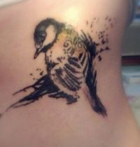 Bird as tattoo on back
