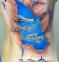 Blue sky and birds tattoo
