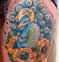 Blue peacock and orange flowers
