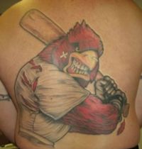 Red bird player tattoo