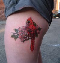 Red bird with cherry blossom tattoo