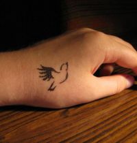 Small dove tattoo
