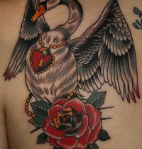 Swan with heart necklace