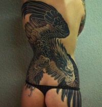 The  tattoo on back with black