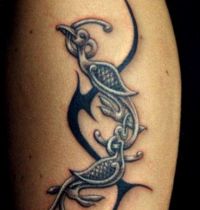 Tribal motive of bird tattoo