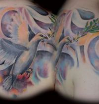 White doves with olive branch tattoo