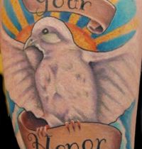 White dove with ribbon tattoo