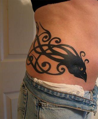 Tribal peacock black tattoo