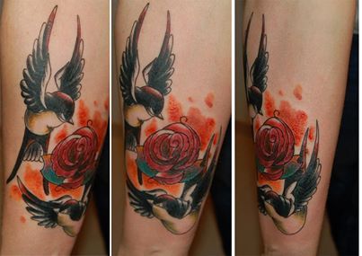 Two swallows aroun rose tattoo