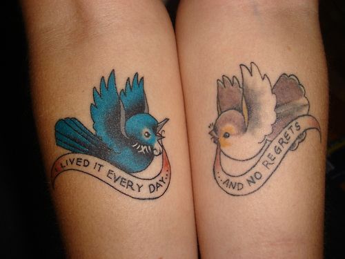 Two tattoos with birds