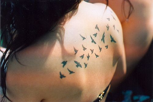 Small birds back tattoo