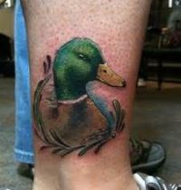 Ankle tattoo with duck