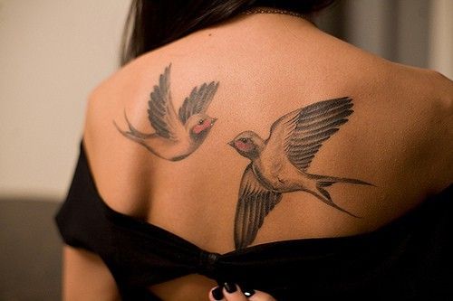 Two birds on tattoo